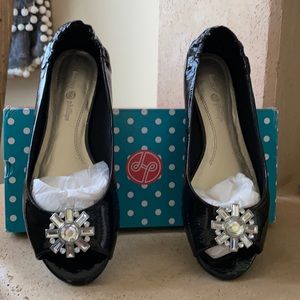 Lindsay Phillips patent ballet flats.